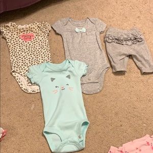 3 one pieces and one pair of bottoms